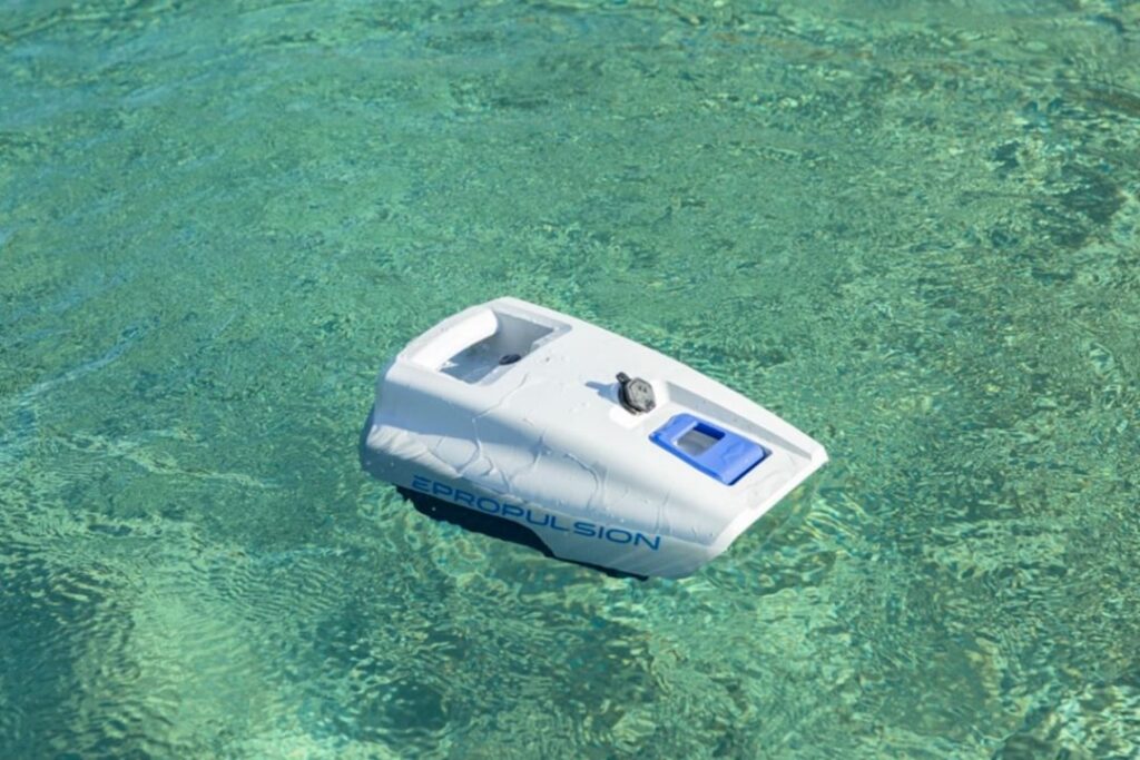 Photo of a waterproof battery from ePropulsion’s Spirit series, floating on water.