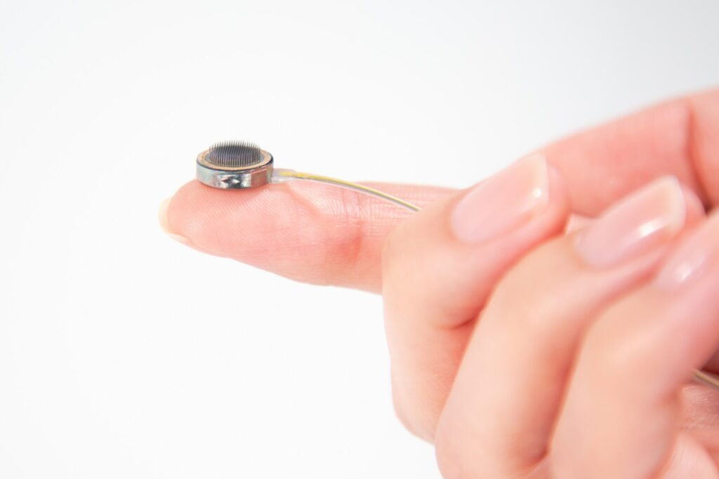 Photo of a cortical module developed by Paradromics. This implantable device is designed to record individual brain signals and translate thoughts into actions.