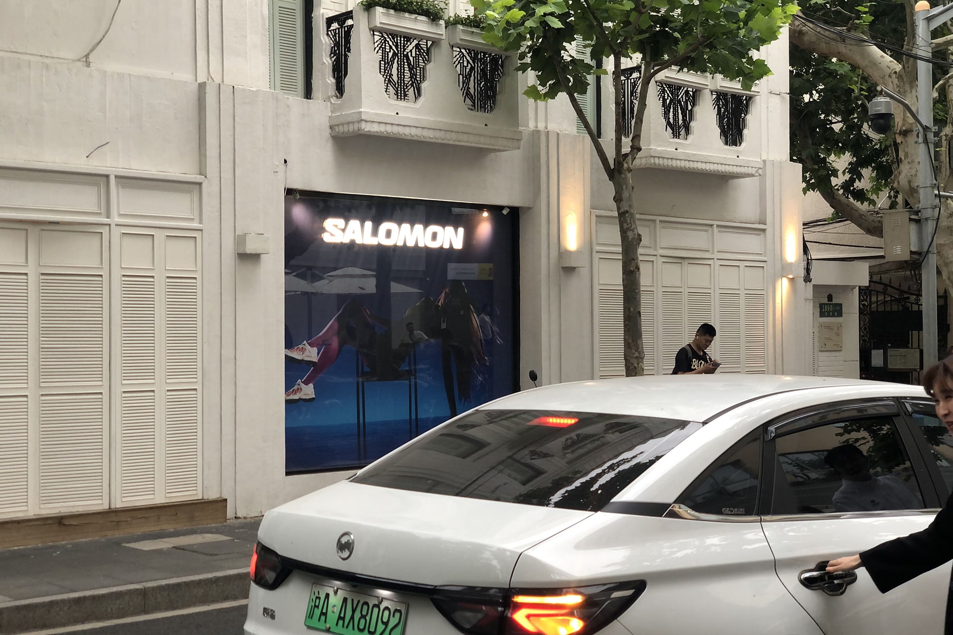 Photo shows a storefront display occupied by Salomon, located along a stretch of Anfu Road.