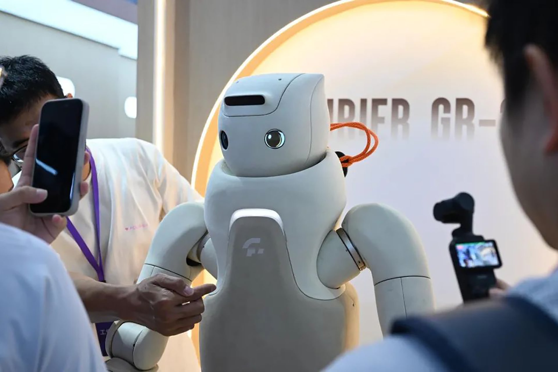 Photo of the Fourier GR-3 on display, a humanoid robot designed for emotional interaction and companionship.