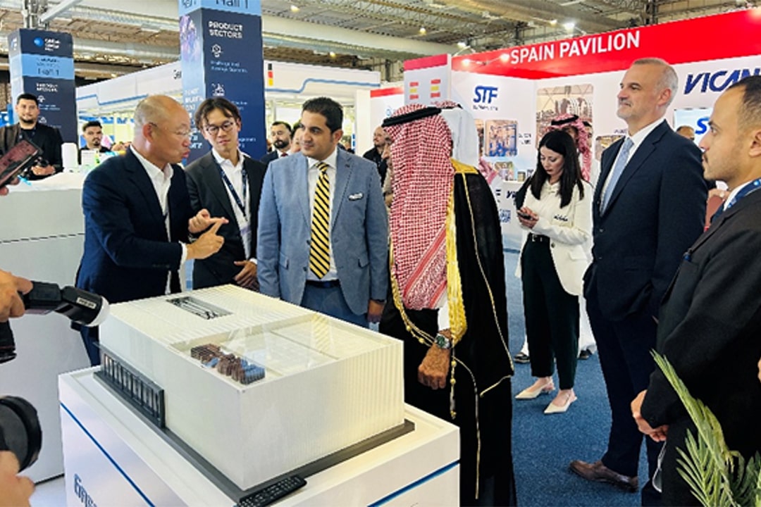 Photo shows GreenTech chairman Eric Zhang (first from left) presenting Newater House to visitors at the expo, including Mutaz Al Mazari (third from left), portfolio director at DMG, and Abdulmohsen Alkhayal, executive director of the local content division at the Saudi Fund for Development (fourth from left).