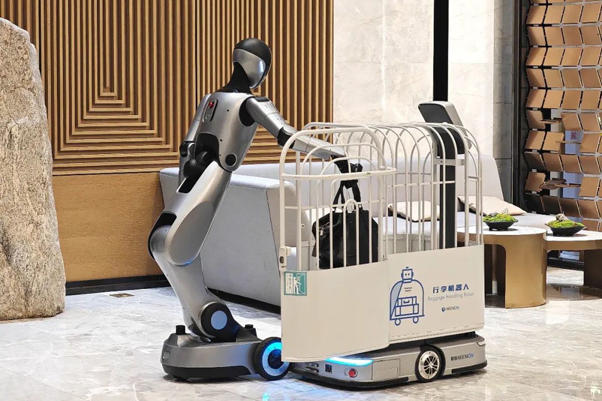 Photo of a baggage handling robot deployed by Keenon Robotics at a client hotel.