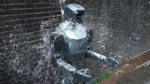 Graphic shows the DR02 humanoid robot being splashed with water to demonstrate its IP66-rated water resistance.