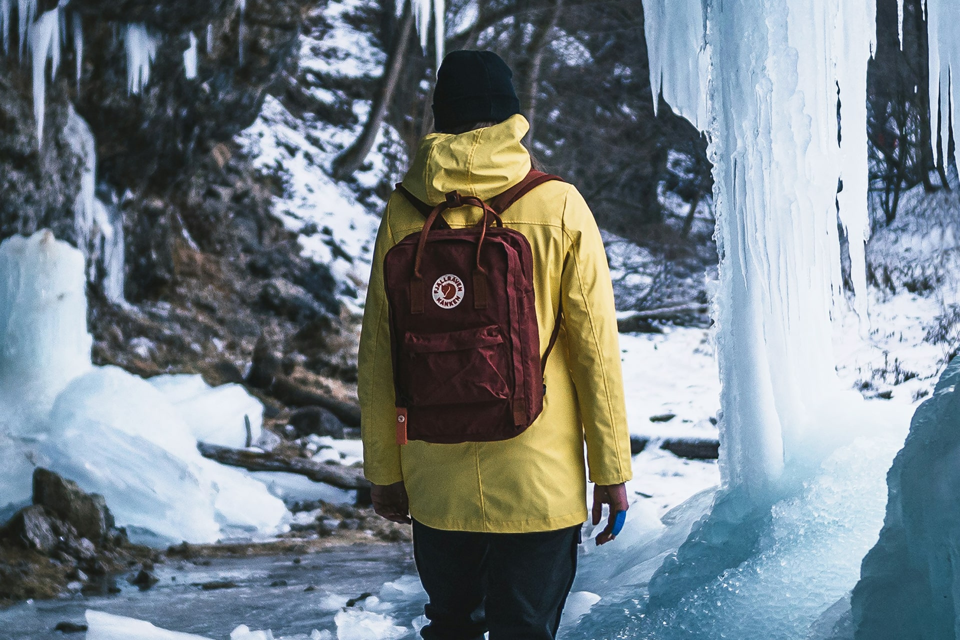 Photo of the iconic Kanken backpack in an icy outdoor setting.