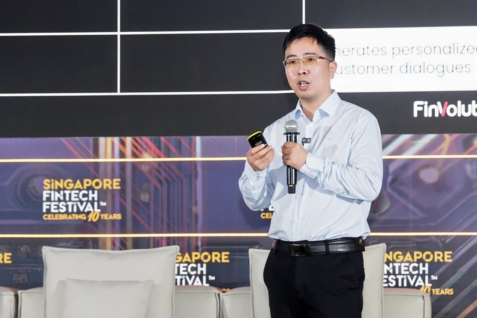 Photo of Lei Chen, vice president at FinVolution, speaking during a segment on November 12 at the Singapore FinTech Festival 2025.
