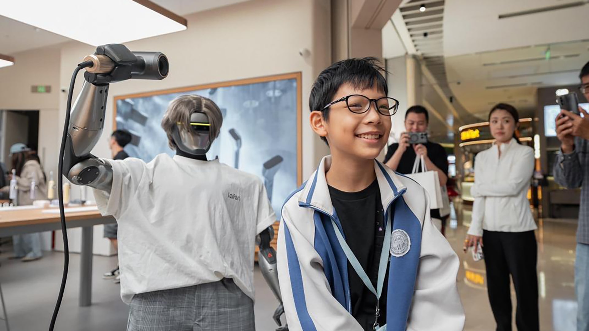 Photo of a robot deployed by Laifen at its flagship store to demonstrate the capabilities of its hair dryer range.