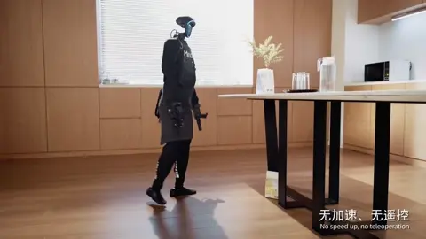 Graphic showing a Unitree humanoid robot crouching down to pick up an object.