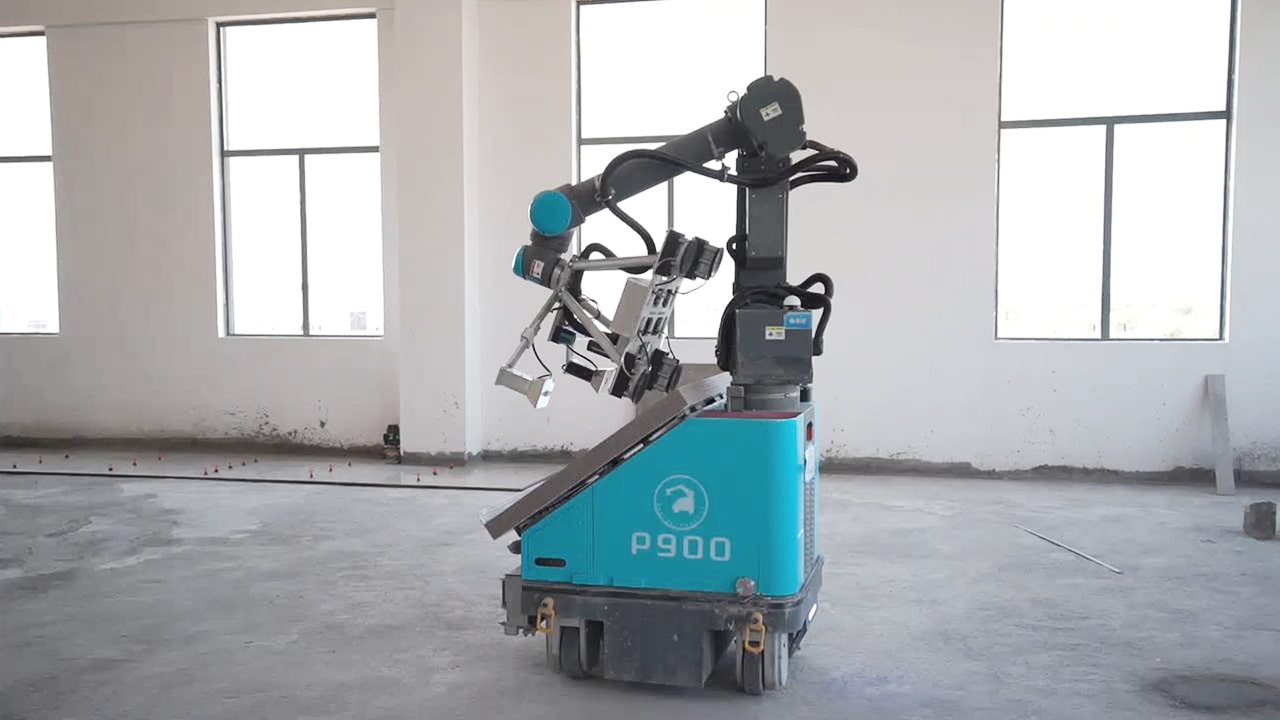 Photo of the P900, a floor tile paving robot developed by Partner Robotics, designed for precision and efficiency.