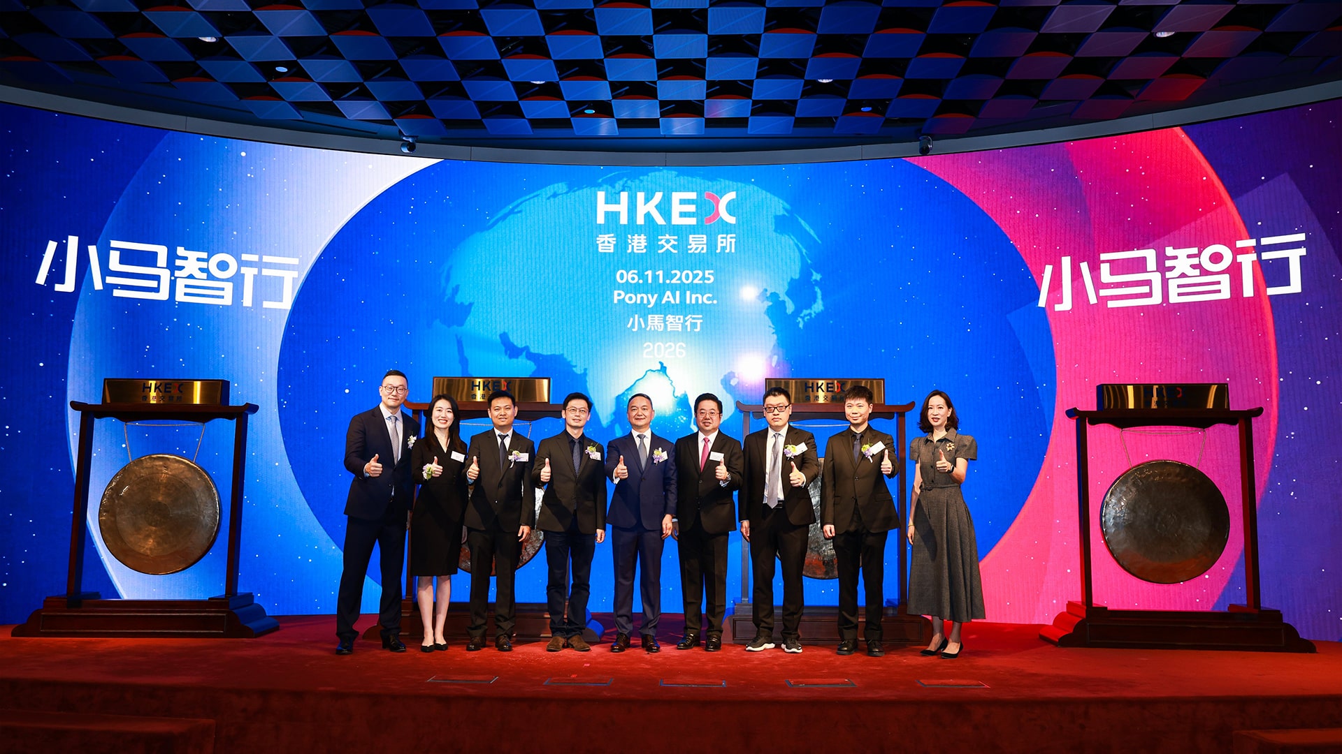 Photo of Pony.ai’s team celebrating the company’s listing on the Hong Kong Stock Exchange on November 6.