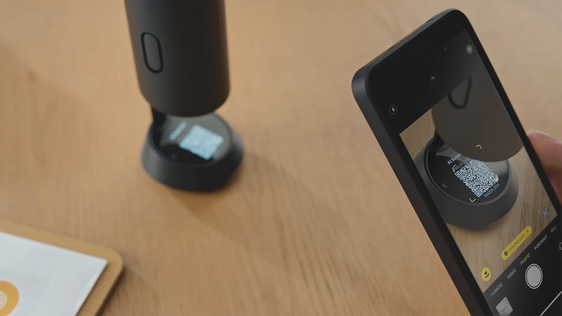 Photo shows the Wave microphone’s QR code function, which allows users to access AI-generated conversation or meeting summaries.