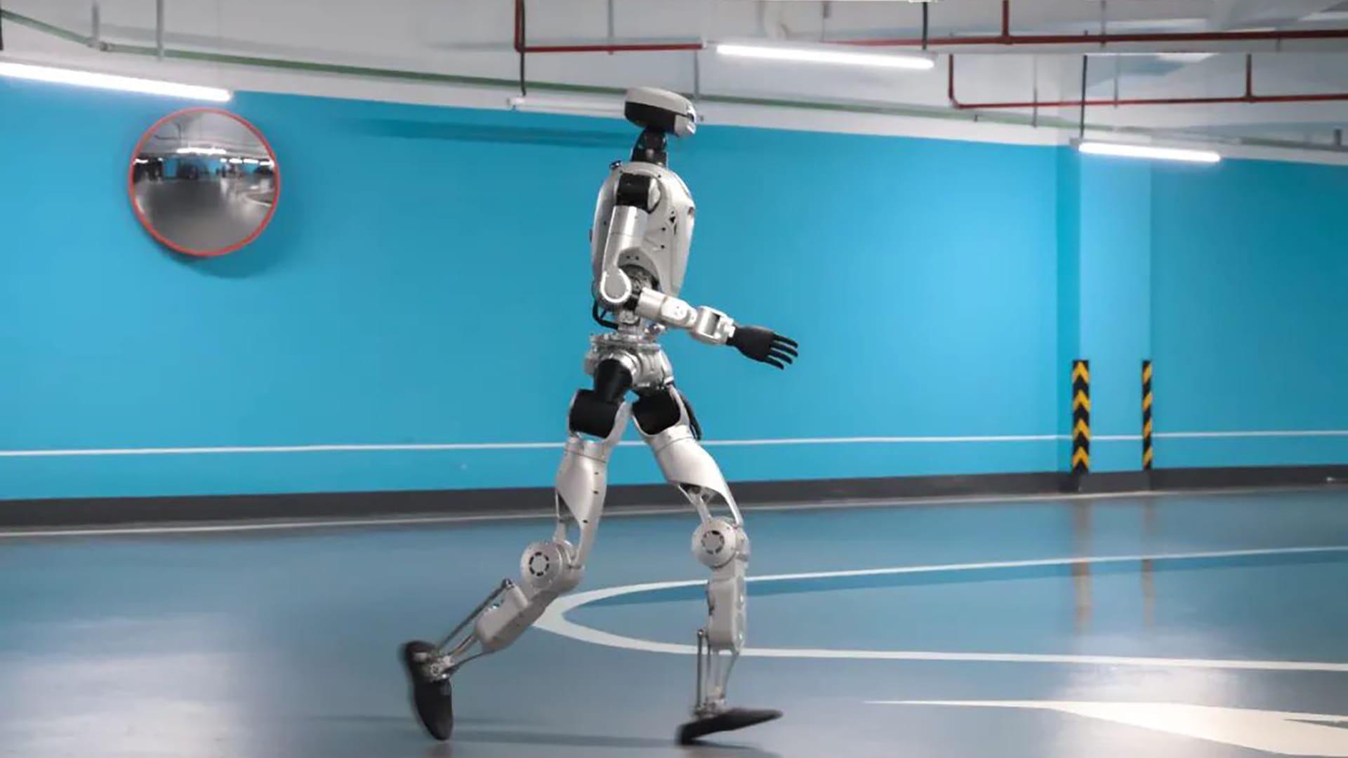 Image of the Oli humanoid robot, pictured while running.