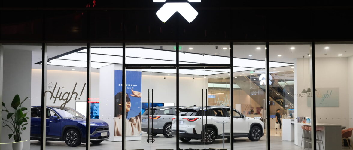 A Nio showroom in Shanghai, China, circa 2021. Photo source: Dreamstime (<a href="https://www.dreamstime.com/robertwei_info" style="border-bottom: 1px solid #1266f1; text-decoration: none;" onmouseover="this.style.color='#1266f1'" onmouseout="this.style.color=''">RobertWei</a>, ID: 255080716).