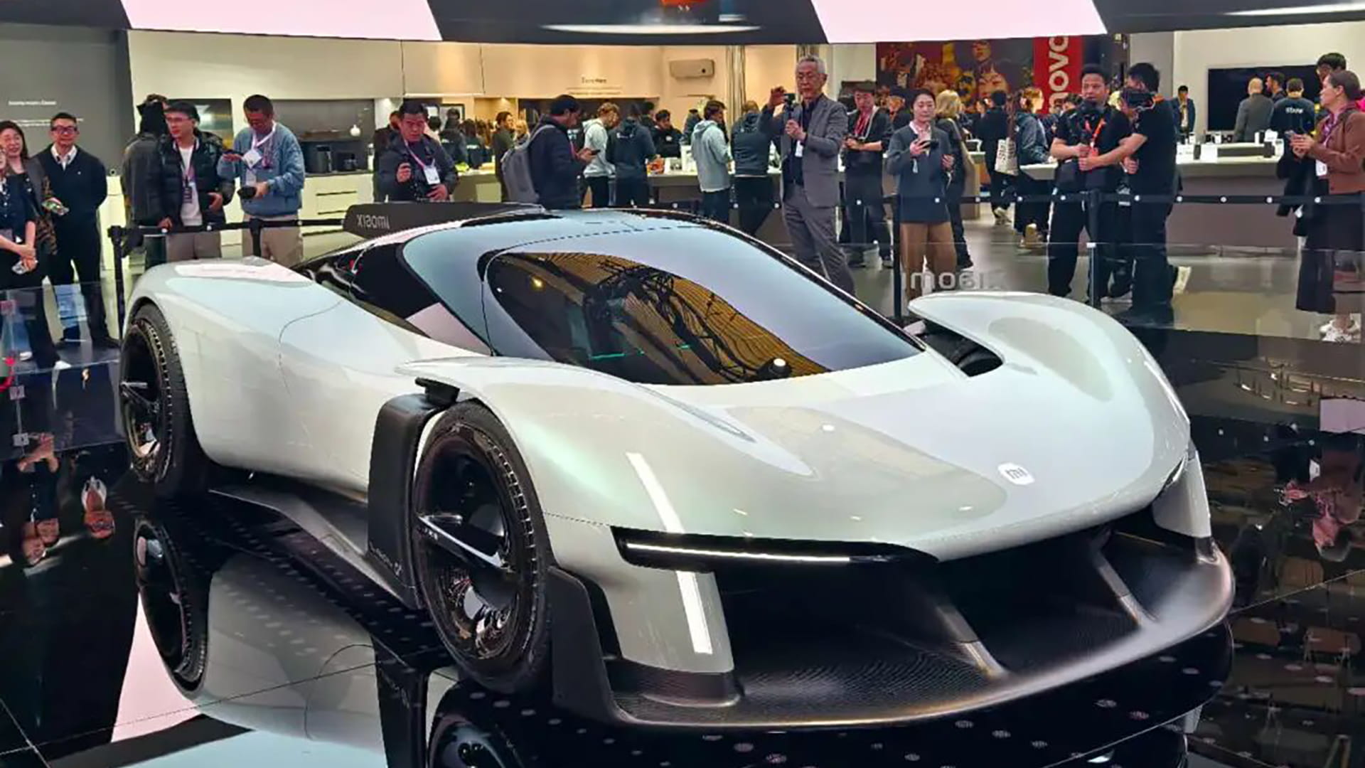 Photo shows Xiaomi’s VGT concept car, on display at MWC 2026.
