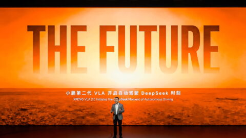 He Xiaopeng, chairman and CEO of Xpeng, speaking at the launch of the company’s second-generation vision-language-action system. Photo source: Xpeng via 36Kr.