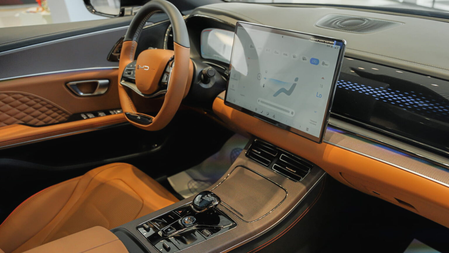 The interior of a BYD Han. Photo source: Dreamstime (<a href="https://www.dreamstime.com/ntvroman_info" style="border-bottom: 1px solid #1266f1; text-decoration: none;" onmouseover="this.style.color='#1266f1'" onmouseout="this.style.color=''">Roman Nurutdinov</a>, ID: 385287352).