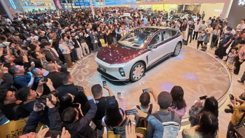 Visitors examine the Nio ET9 at the Beijing Auto Show on April 26. Photo source: Ju Huanzong (Xinhua).