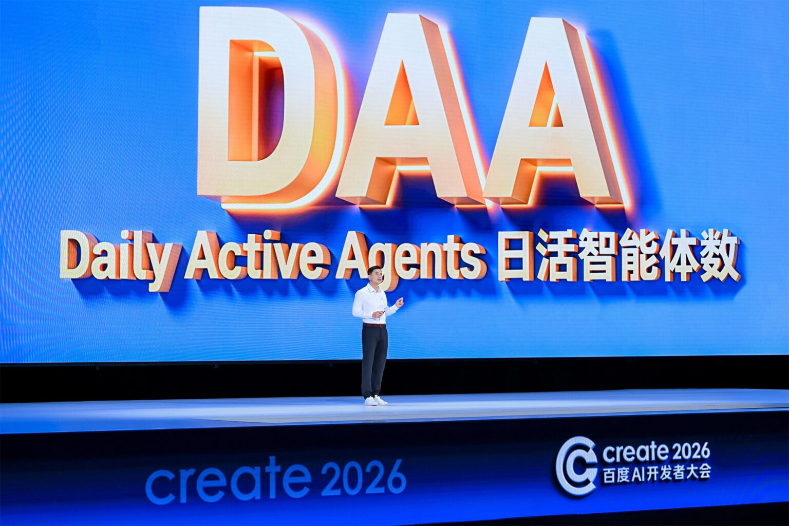 Robin Li, co-founder and CEO of Baidu, speaking about the “daily active agents” metric at Baidu Create 2026. Photo courtesy of the company.
