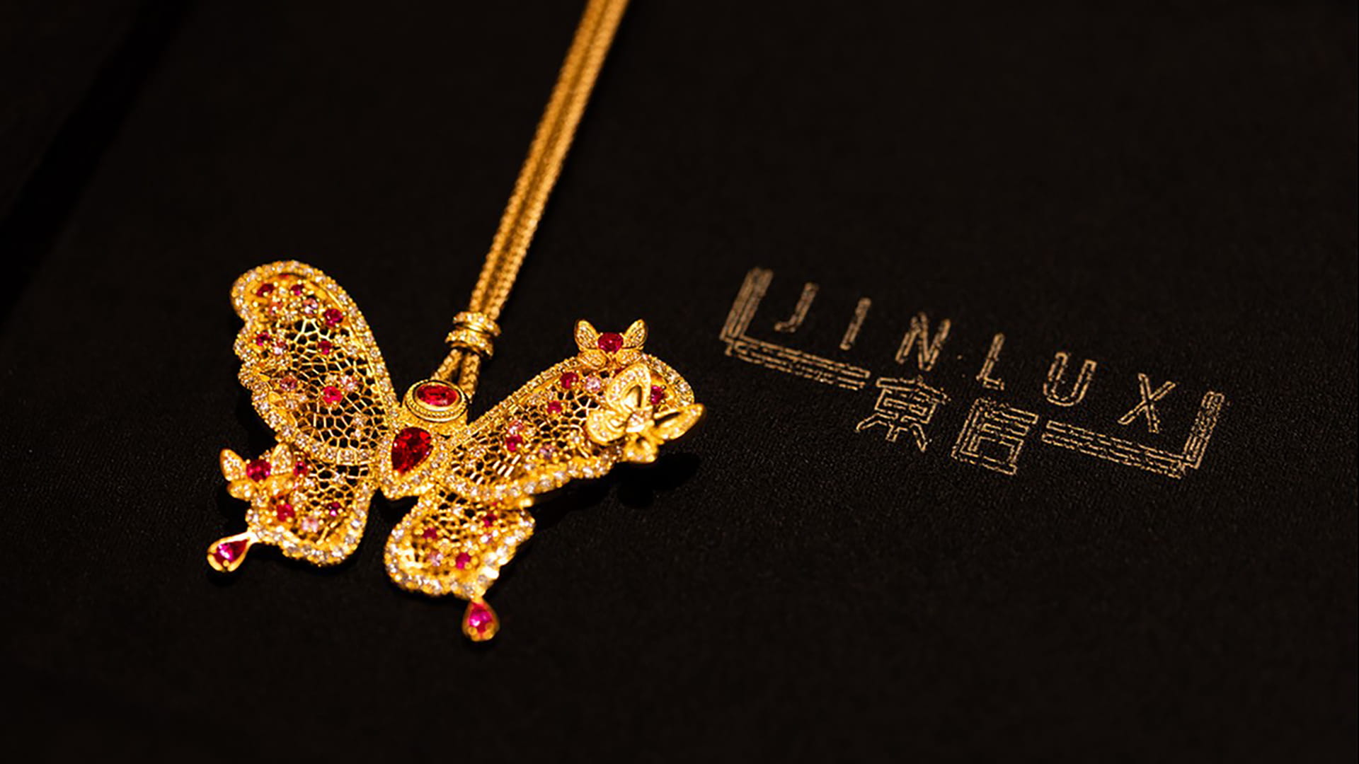 A Jinlux Youyuan series jewelry piece featuring a stylized butterfly as its central motif.