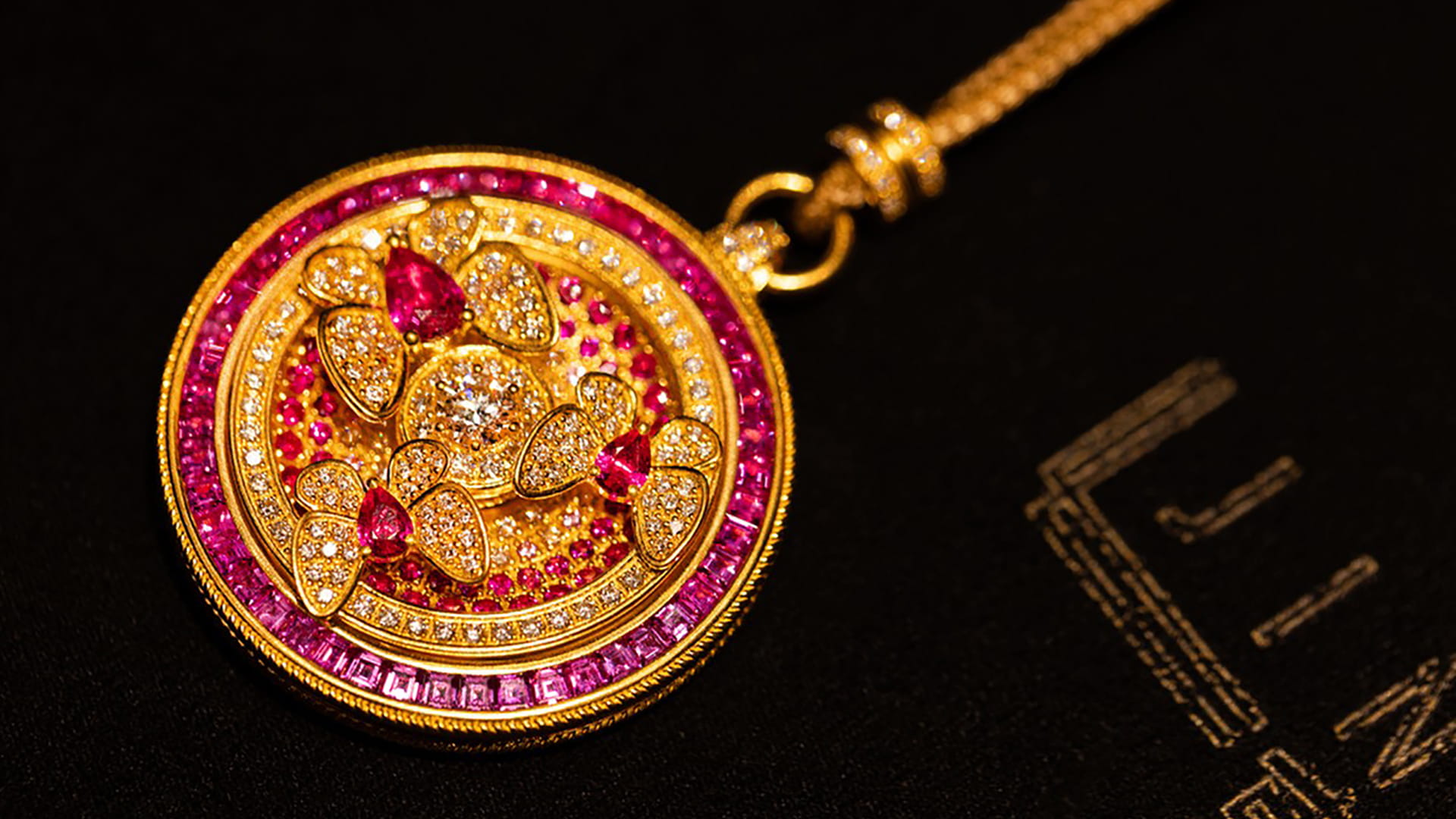 A Jinlux medallion featuring three butterfly ornaments arranged in rotating pairs within a Baoxiang flower-inspired composition.