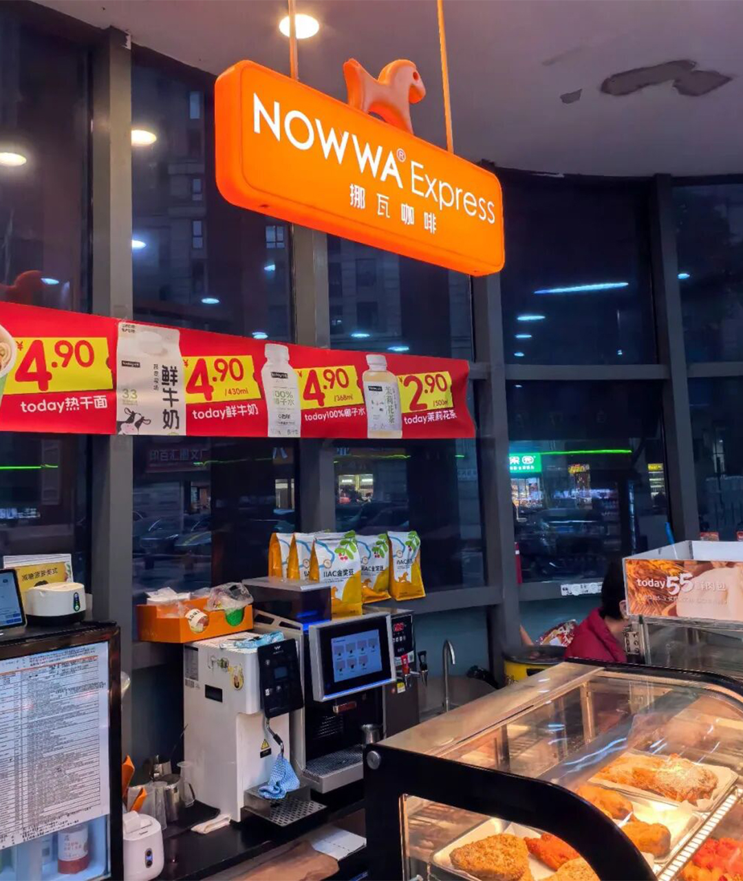 Photo shows a Nowwa Express kiosk inside a convenience store, based on the shop-in-shop model.