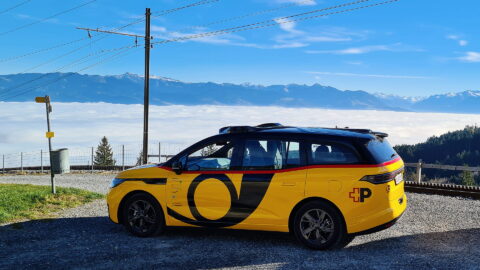 An AmiGo robotaxi operating on an open road in eastern Switzerland. Photo courtesy of the company.