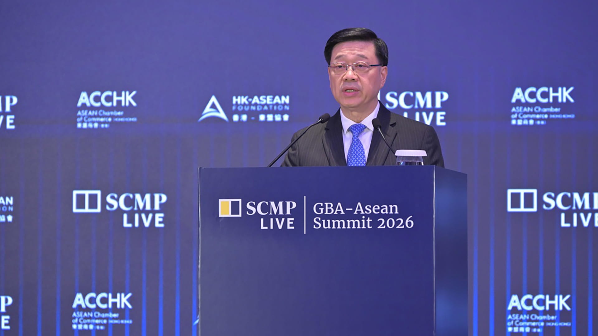 Photo shows John Lee, Hong Kong's Chief Executive, addressing more than 300 delegates and attendees at the GBA-ASEAN Summit 2026.