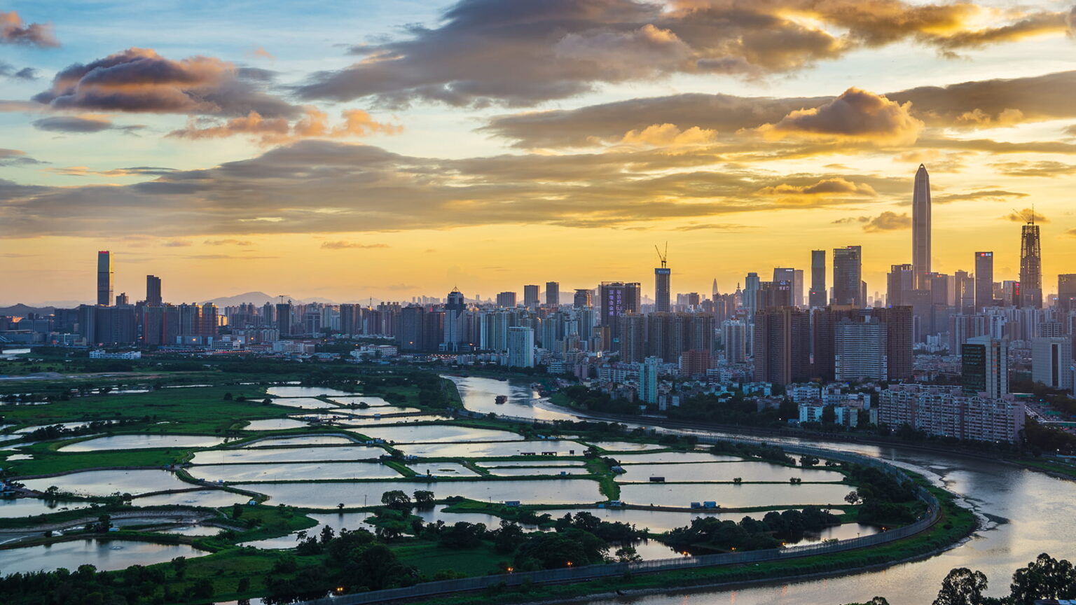 Hong Kong's northern border with Shenzhen (pictured) has long been defined by wetlands and fish ponds. As the Northern Metropolis takes shape over the coming decade, the area is expected to become central to the city’s efforts to deepen links with mainland China and serve as a conduit for companies, capital, technology, and talent moving in both directions. Photo source: Dreamstime (<a href="https://www.dreamstime.com/tokoshi_info" style="border-bottom: 1px solid #1266f1; text-decoration: none;" onmouseover="this.style.color='#1266f1'" onmouseout="this.style.color=''">Tokoshi</a>, ID: 152094561).
