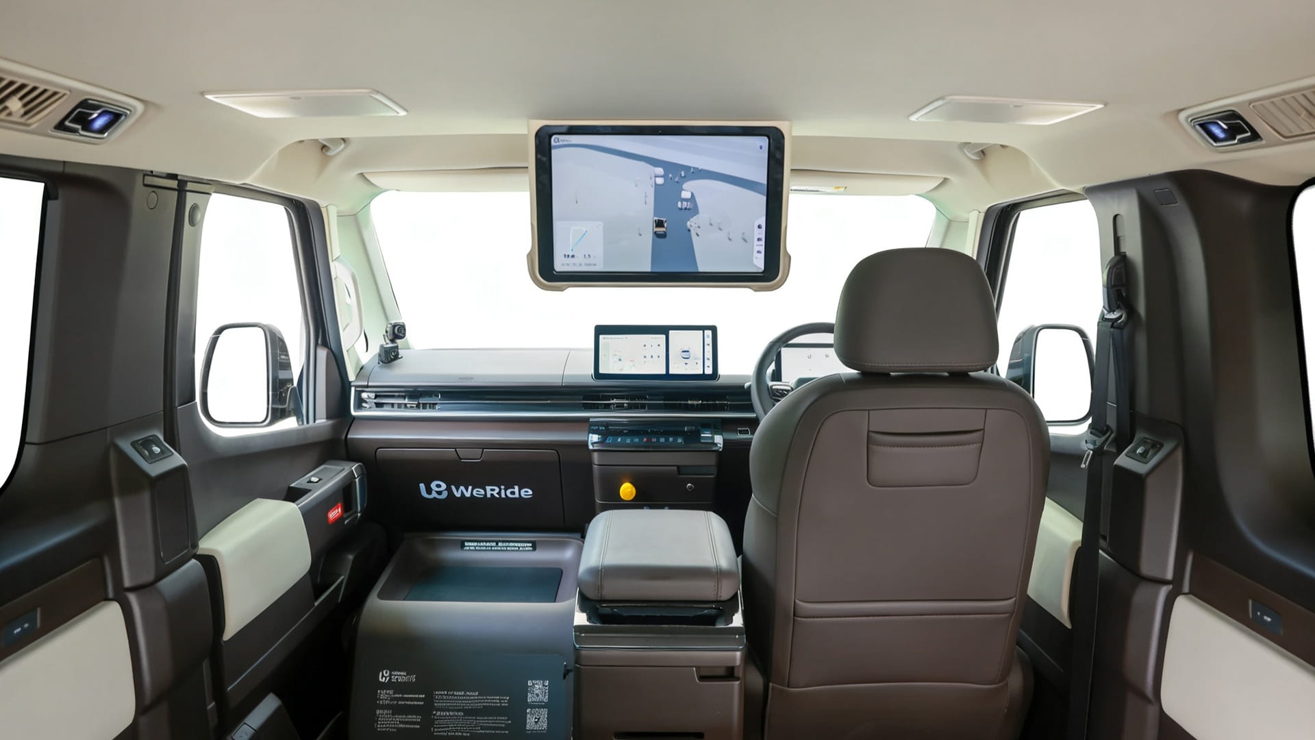 Photo shows the interior of a right-hand-drive WeRide robotaxi.