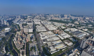 Longhua Science and Technology Park in Shenzhen is one of Foxconn’s major manufacturing sites. Its sprawling industrial complex contains factory buildings arranged in a dense grid. Photo source: Dreamstime (<a href="https://www.dreamstime.com/5822847_info" style="border-bottom: 1px solid #1266f1; text-decoration: none;" onmouseover="this.style.color='#1266f1'" onmouseout="this.style.color=''">5822847</a>, ID: 400939203).