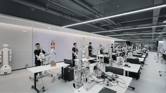 Graphic shows OneRobotics staff collecting data through physical robot teleoperation.