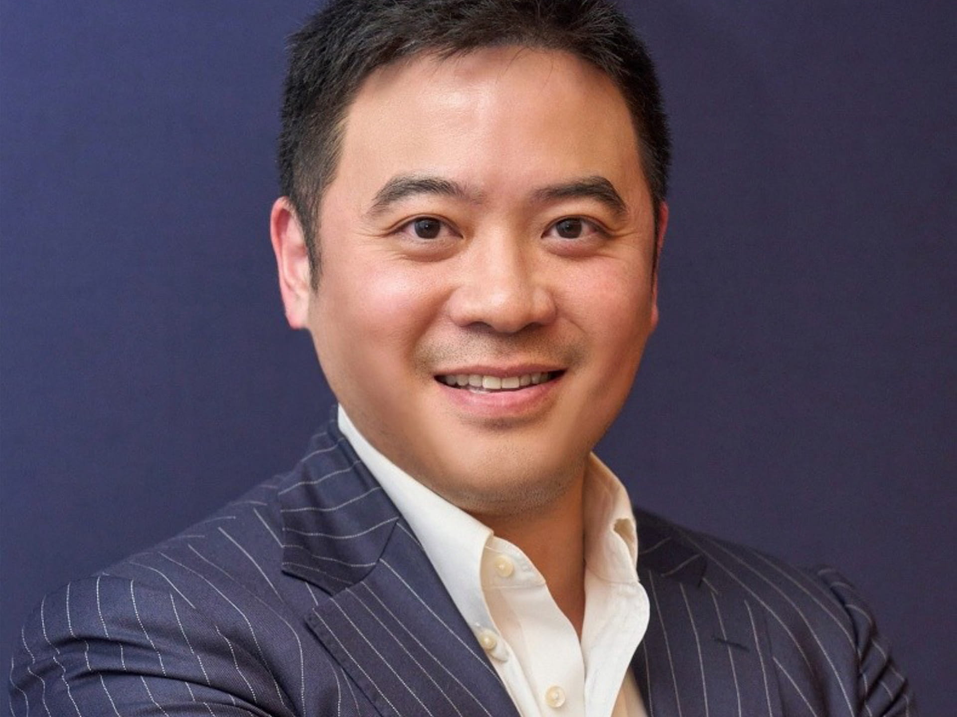 Image shows Gary Kwok, founder and CEO of AXE Management Partners.