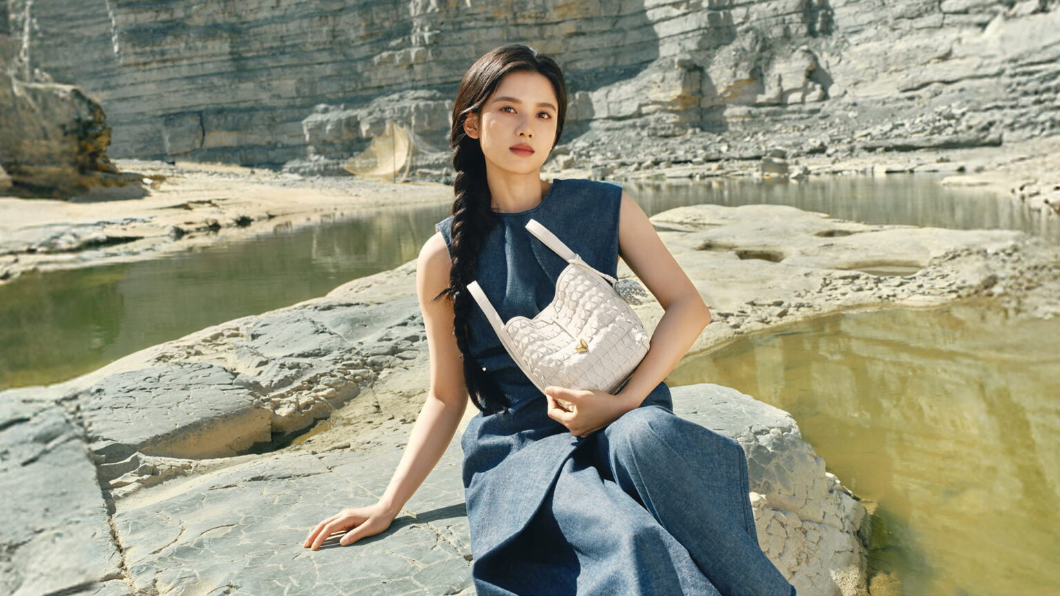 Chinese actress Zhang Jingyi carrying a Songmont bag as part of the brand's The Land Tells campaign. Photo source: Songmont.